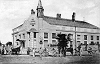 A Bohn Alajos által tervezett Első Szentesi Kenyérgyár épülete Vecsevi István 1918 körül készült lapján. Forrás: Szentesi Élet